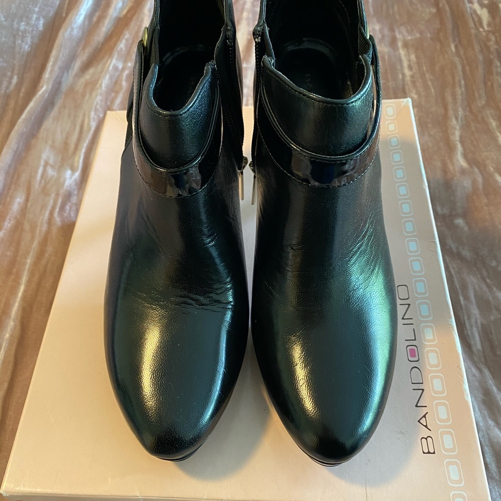 Black leather booties.